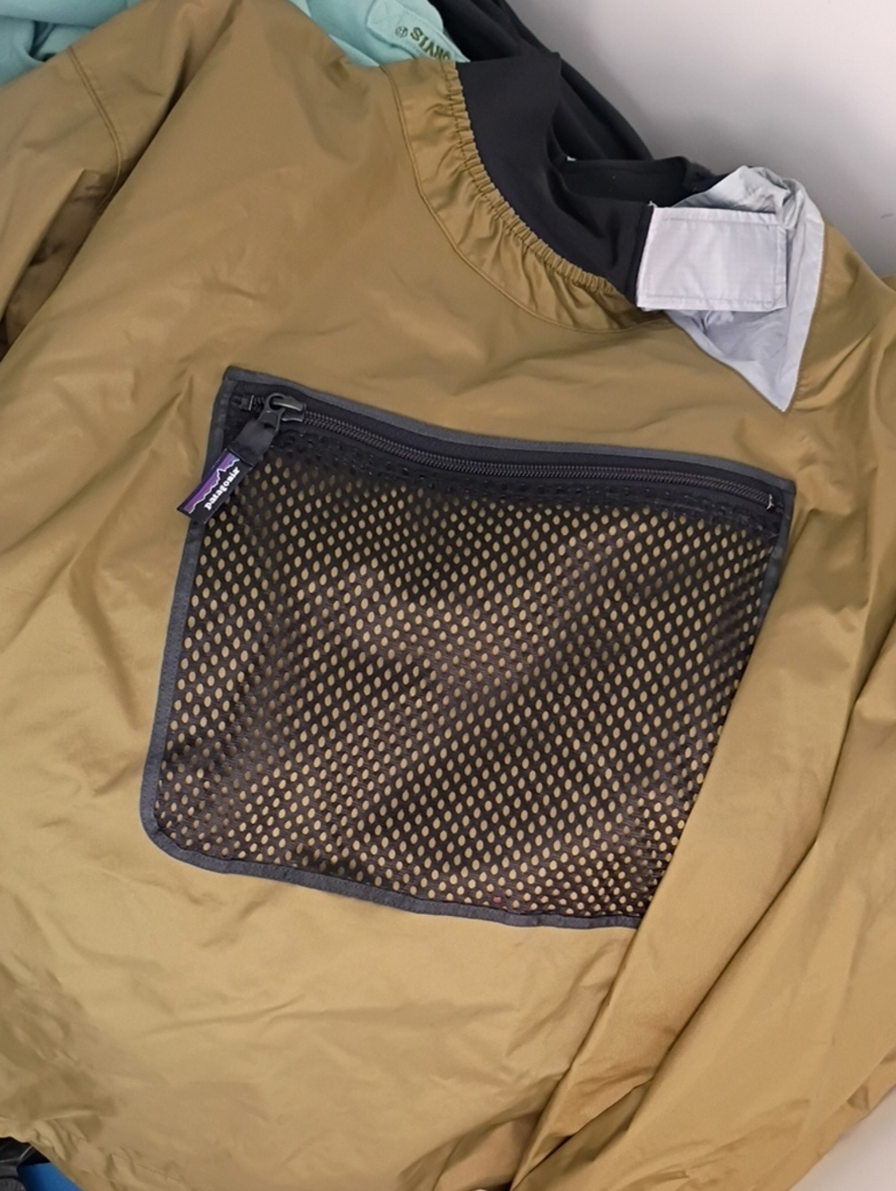 Patagonia Tan Chest Pack with Black Mesh Pocket